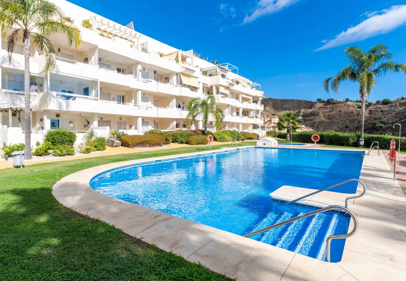 Lejlighed i Mijas Costa - Solrig terrasse med havudsigt og direkte adgang til poolen