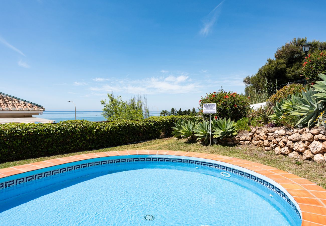 Terraced House in Benajarafe - First line beach, direct access to the pool from terrace