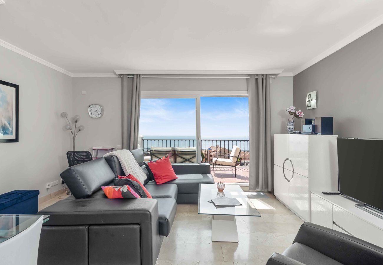 Apartment in Mijas Costa - Magical Sea and Mountain Views with Pool, close to Local Restaurants, Shop, Padel and Golf